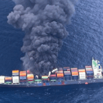Indian coast guard battles massive fire on container ship listing off Kerala