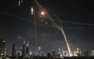 Explosions and Buzzing Drones Heard as Israel and Iran Exchange New Wave of Attacks